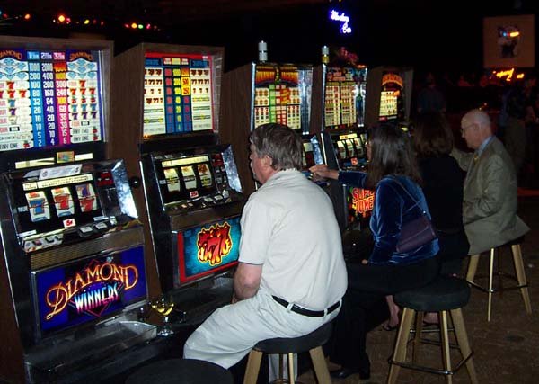 Guests enjoying slot-machine attractions