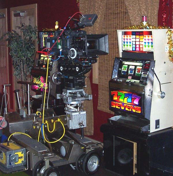 Production camera positioned among slot machines